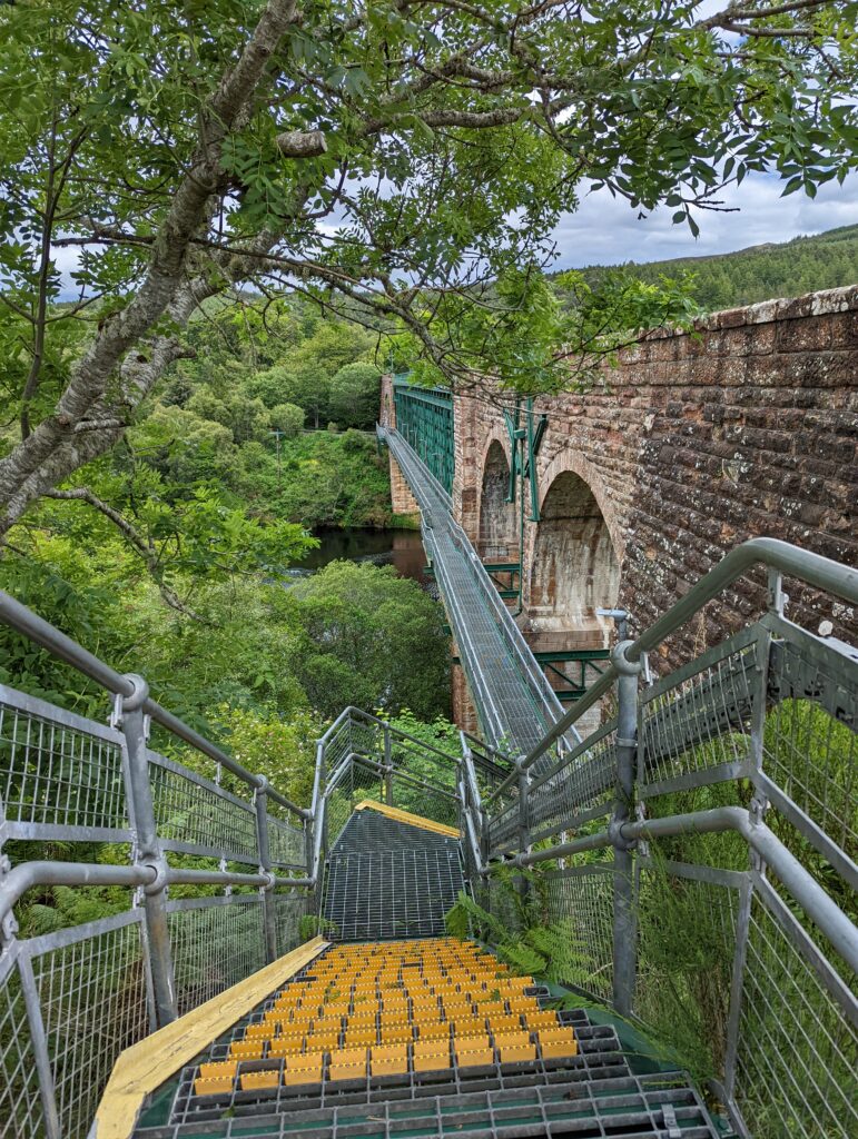 Steps down to cross the Shin Railway Viaduct
